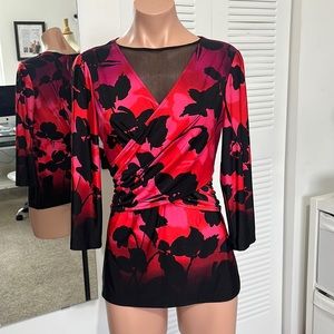 Gorgeous top made in stretch fabric, perfect fit, some evidence of wear…